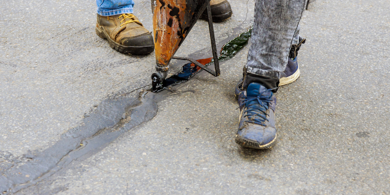 Repairing cracks in Asphalt