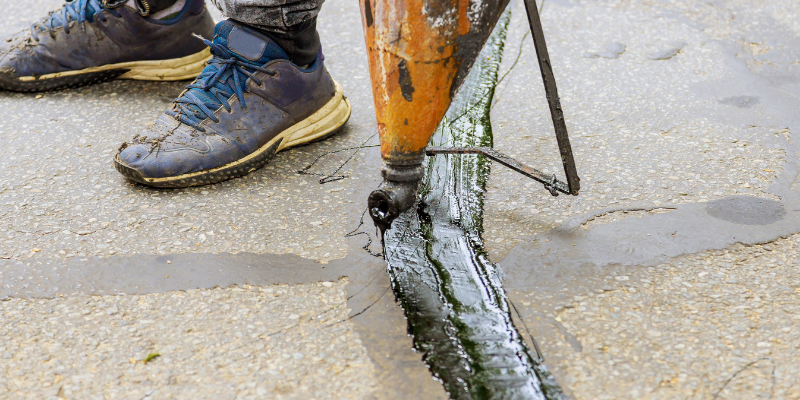 Asphalt Repairs, sealing cracks